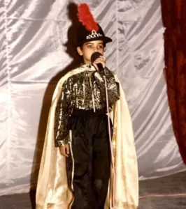 Childhood photo of Suhani Shah performing on stage