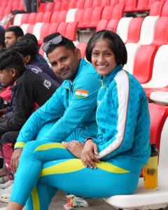 Pooja Singh with her coach Balwan Singh