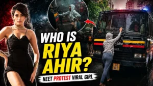 Riya Ahir standing in front of a Mumbai Police van during the NEET protest.